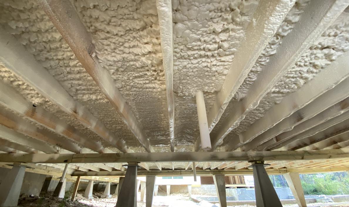 Image of subfloors with insulation applied to it